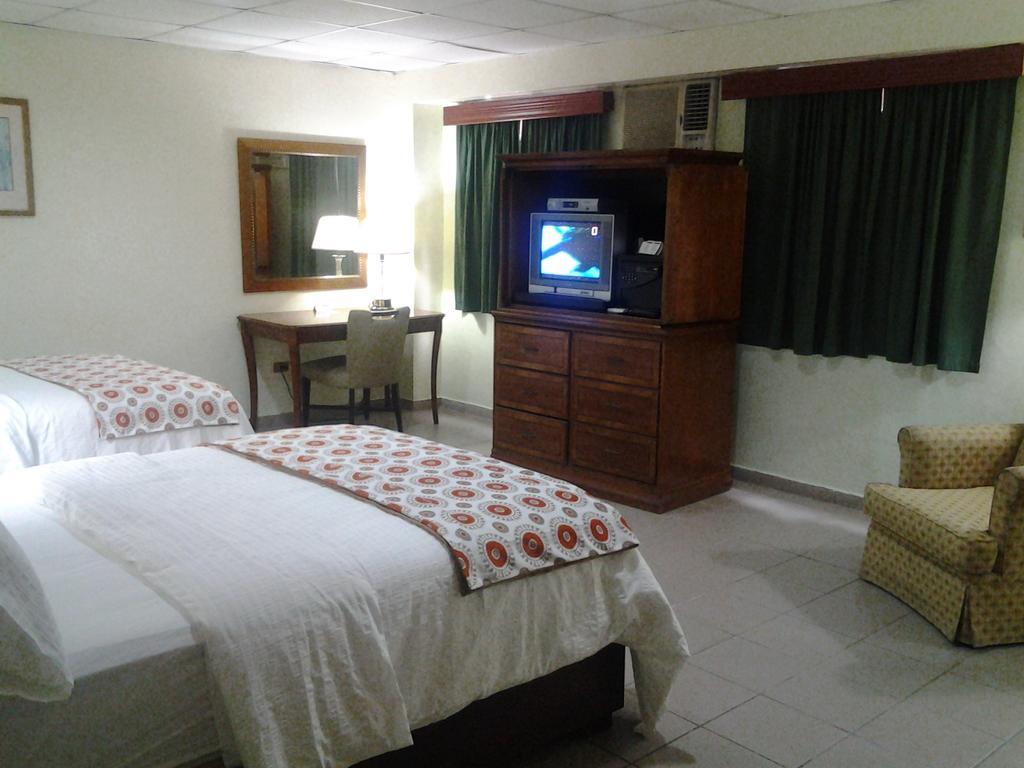Micro Hotel Condo Suites Санто-Домінго Номер фото